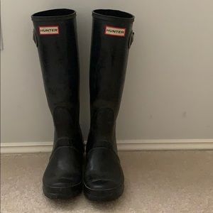 Used tall hunter boots
